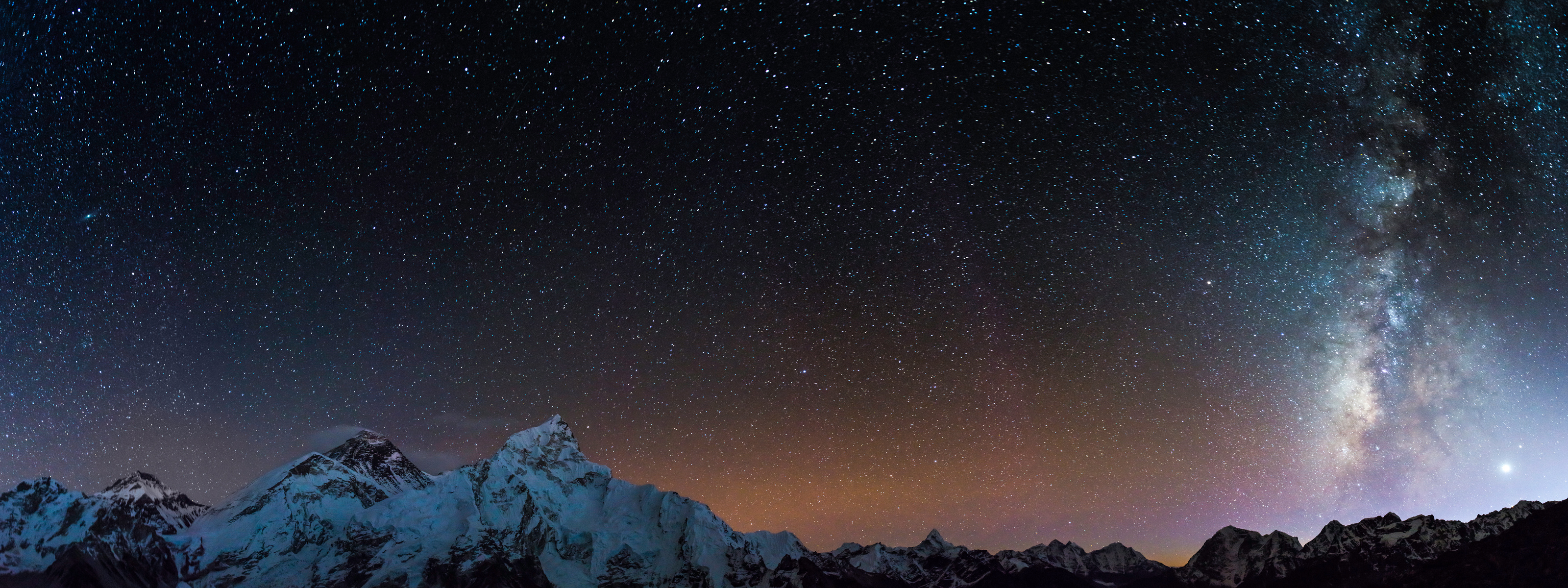 Milky Way stars shining Mt Everest summit Himalaya mountains Nepal